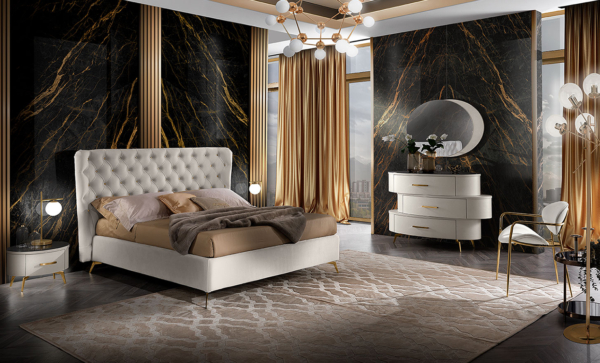 κρεβάτι υφασμάτινο καπιτονέ με χρυσά γυαλιστερά πόδια
